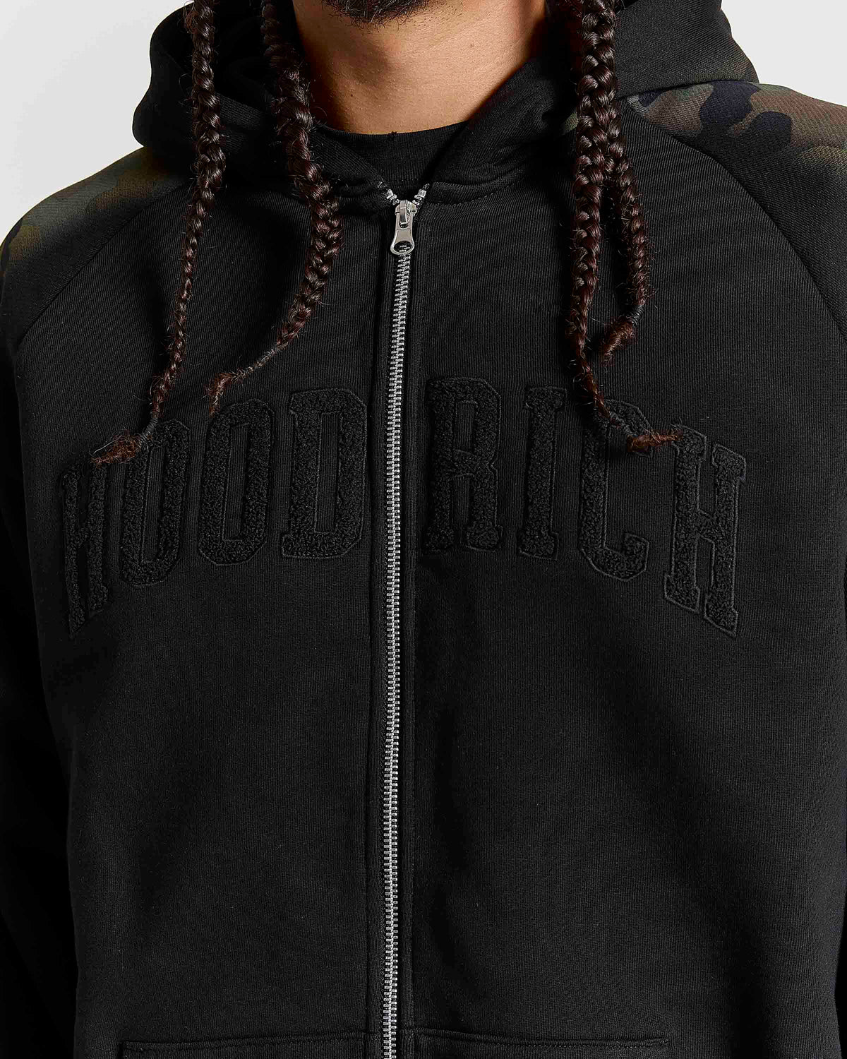 Displays a model wearing the Black Camo 'Hoodrich' branded men's Shade Matching Shorts Set 