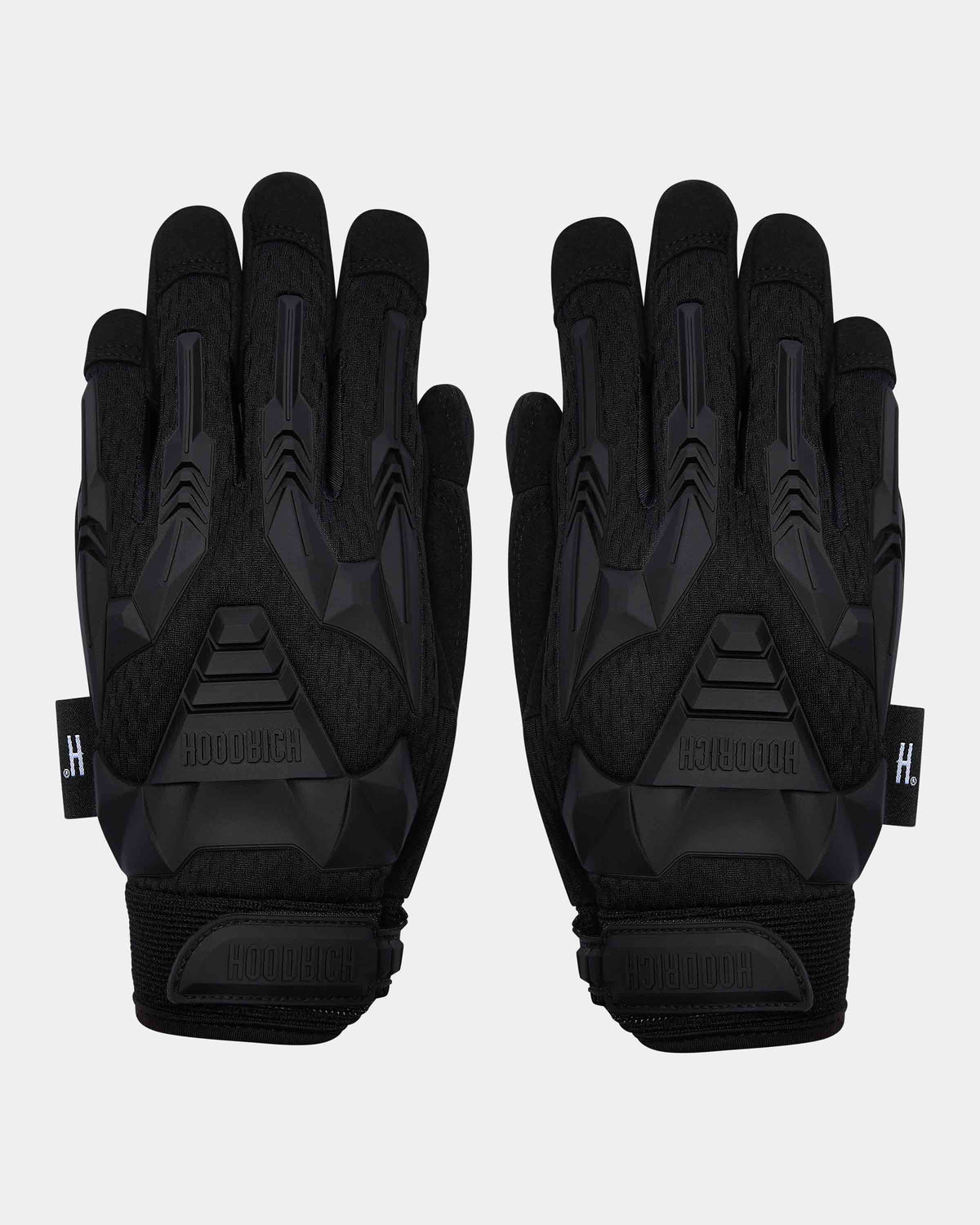 A pair of black tactical gloves shown from the back, featuring textured panels, protective grip zones, and a visible HOODRICH logo on the wrist tabs, set against a light gray background.