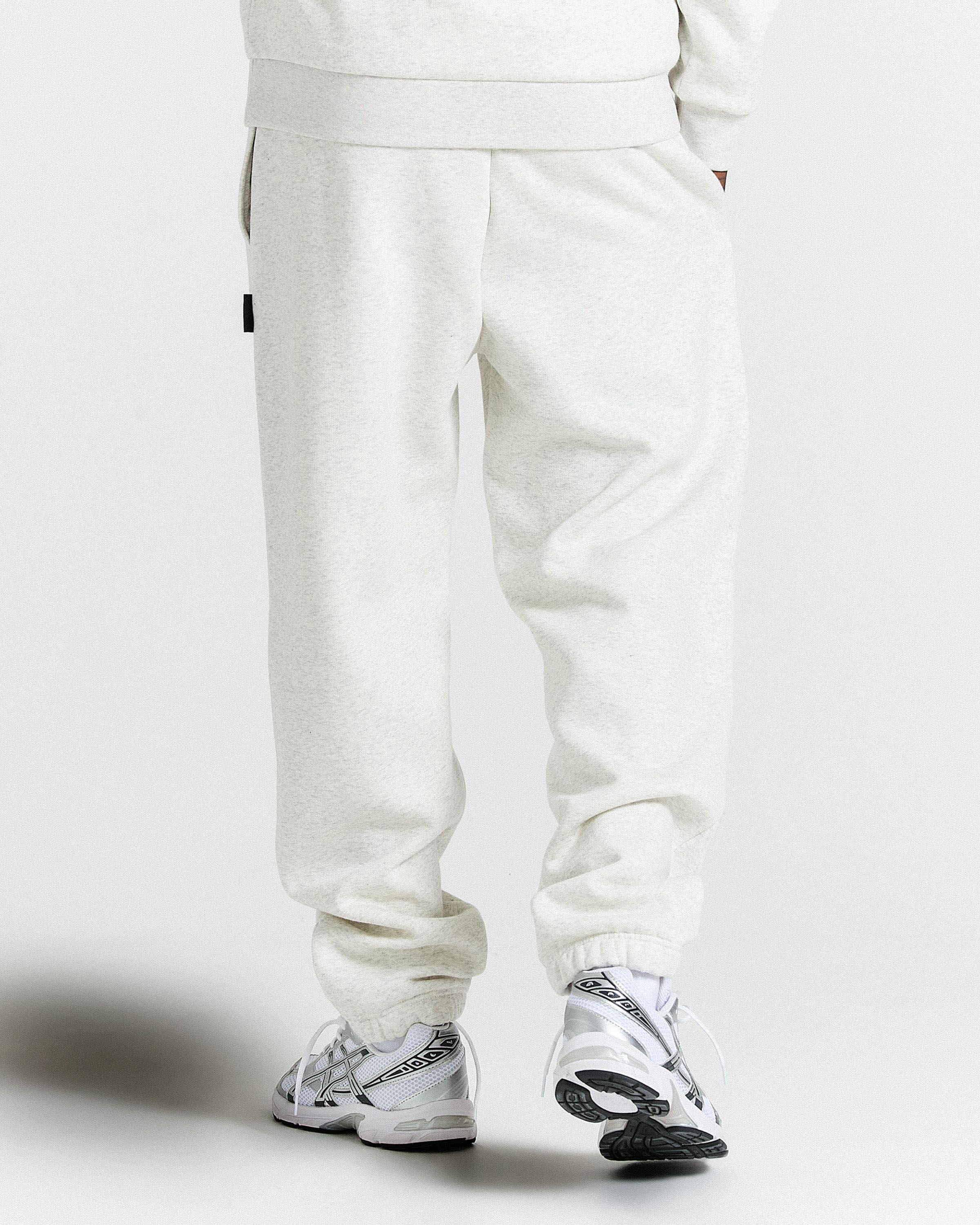 White pants and sneakers on a white background