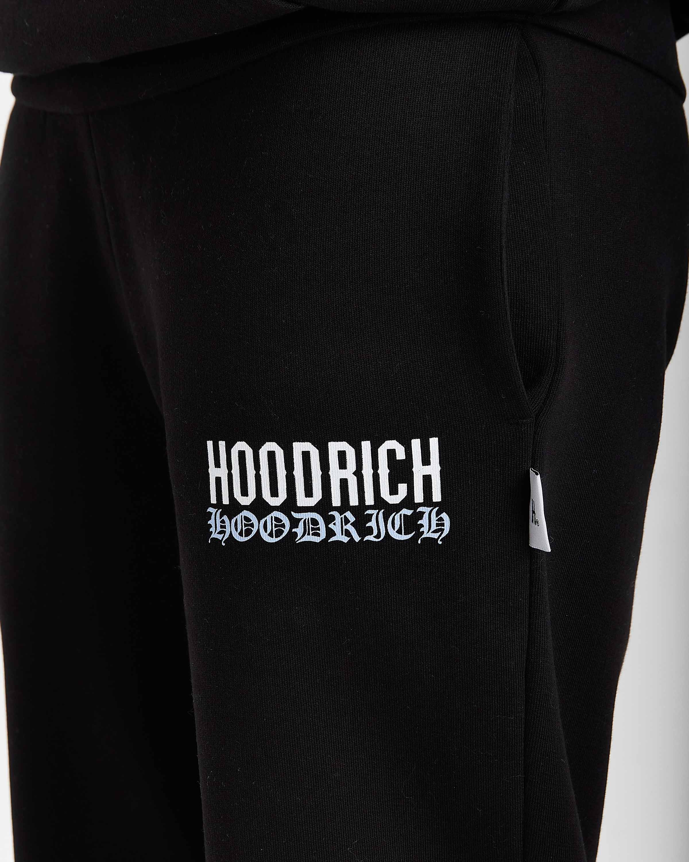 Black sweatpants with 'Hoodrich' logo on a white background